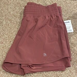 Brand new with tags. Never worn athletic shorts.